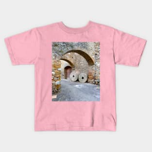 Where would you ride on these stone wheels? Kids T-Shirt